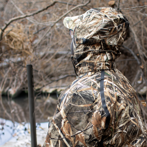 Hunter in camouflage in the woods